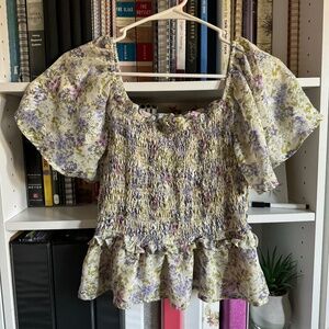 Floral print smocked crop top with ruffled sleeves and elasticized back